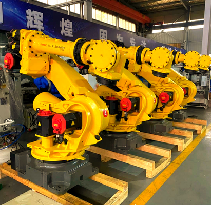 Sel pemotong laser FANUC dengan loading / unloading otomatis dan meja putar untuk produksi massal benda kerja logam 3D di industri otomotif